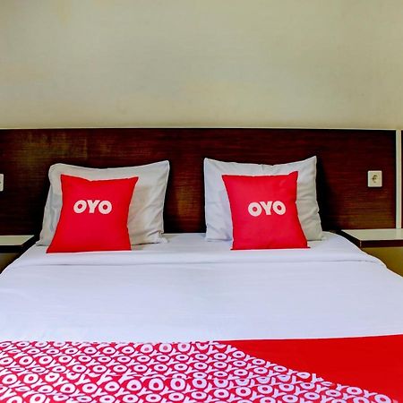 Oyo 90162 Remboelan Guest House Sungai Lutus Luaran gambar