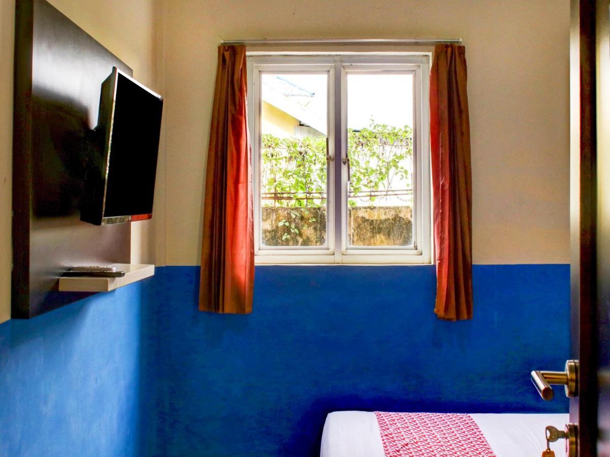 Oyo 90162 Remboelan Guest House Sungai Lutus Luaran gambar