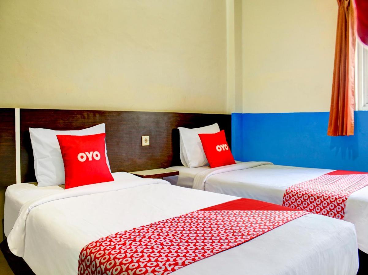 Oyo 90162 Remboelan Guest House Sungai Lutus Luaran gambar