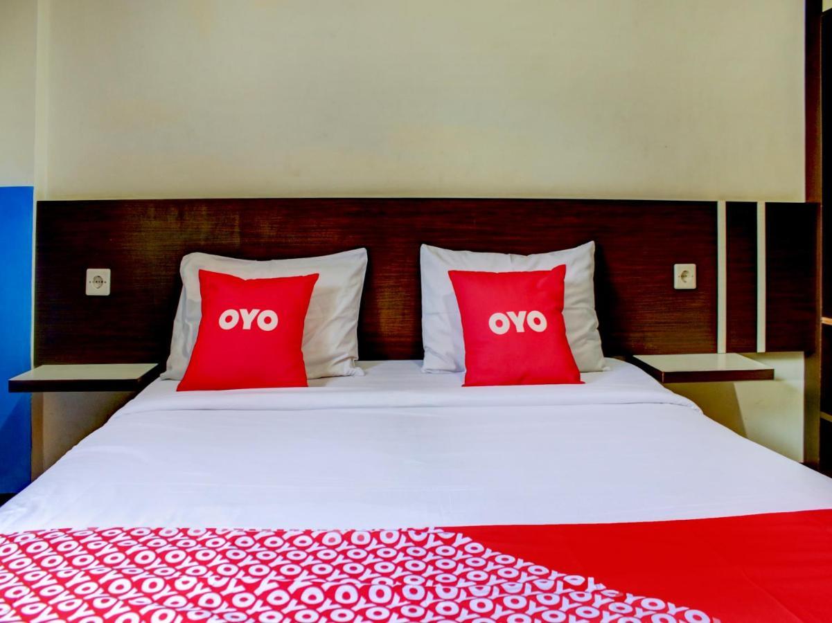 Oyo 90162 Remboelan Guest House Sungai Lutus Luaran gambar